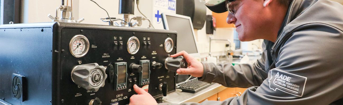 Student adjusting dials on a Twin Cell UCA