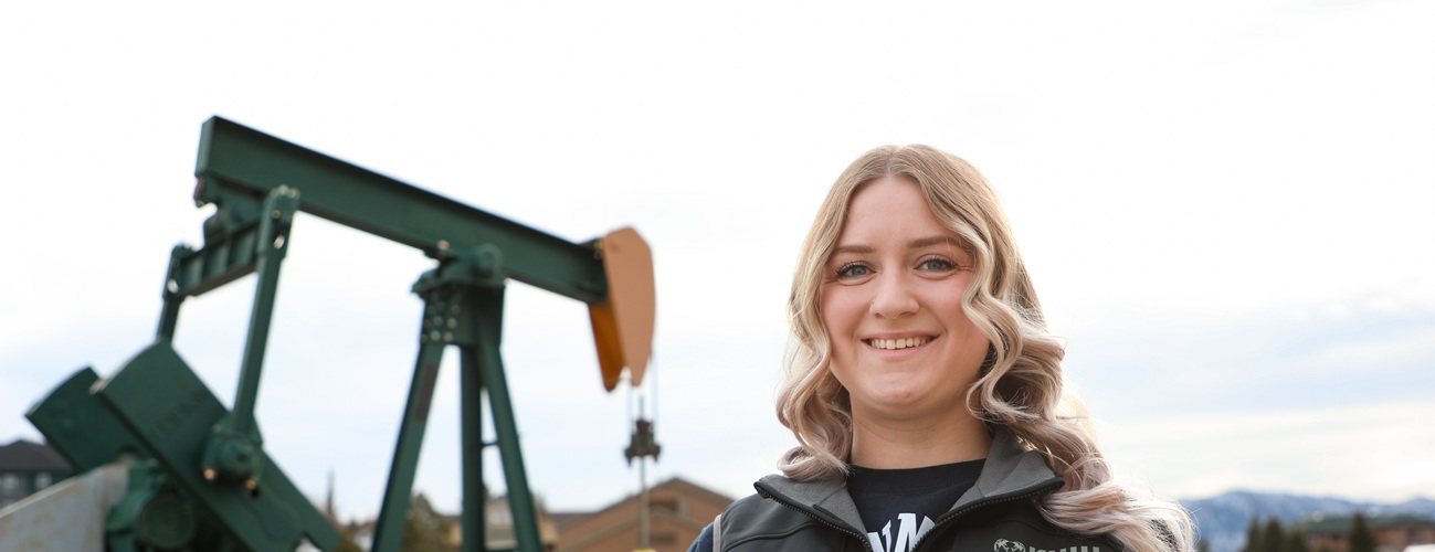 Petroleum engineering student using drilling equipment