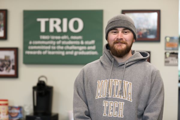 Riley Huckins, TRIO alumnus in the TRIO office