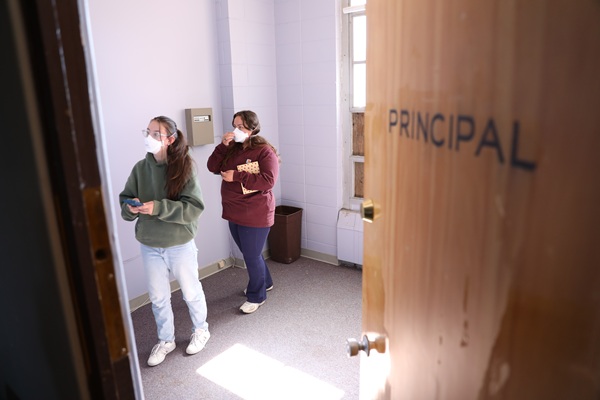 !Two students outside the principal's office of Blaine School