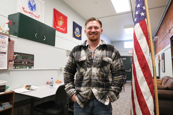 !Matthew Ashcraft with flag