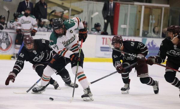 !A Montana Tech hockey player in a game.