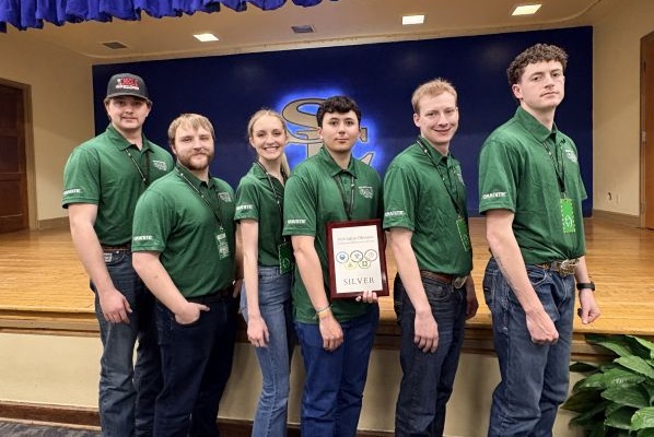 !Safety Olympics students pose with their plaque