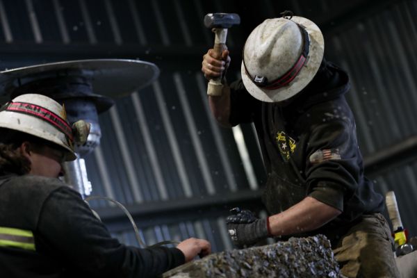 !Students participate in handsteel